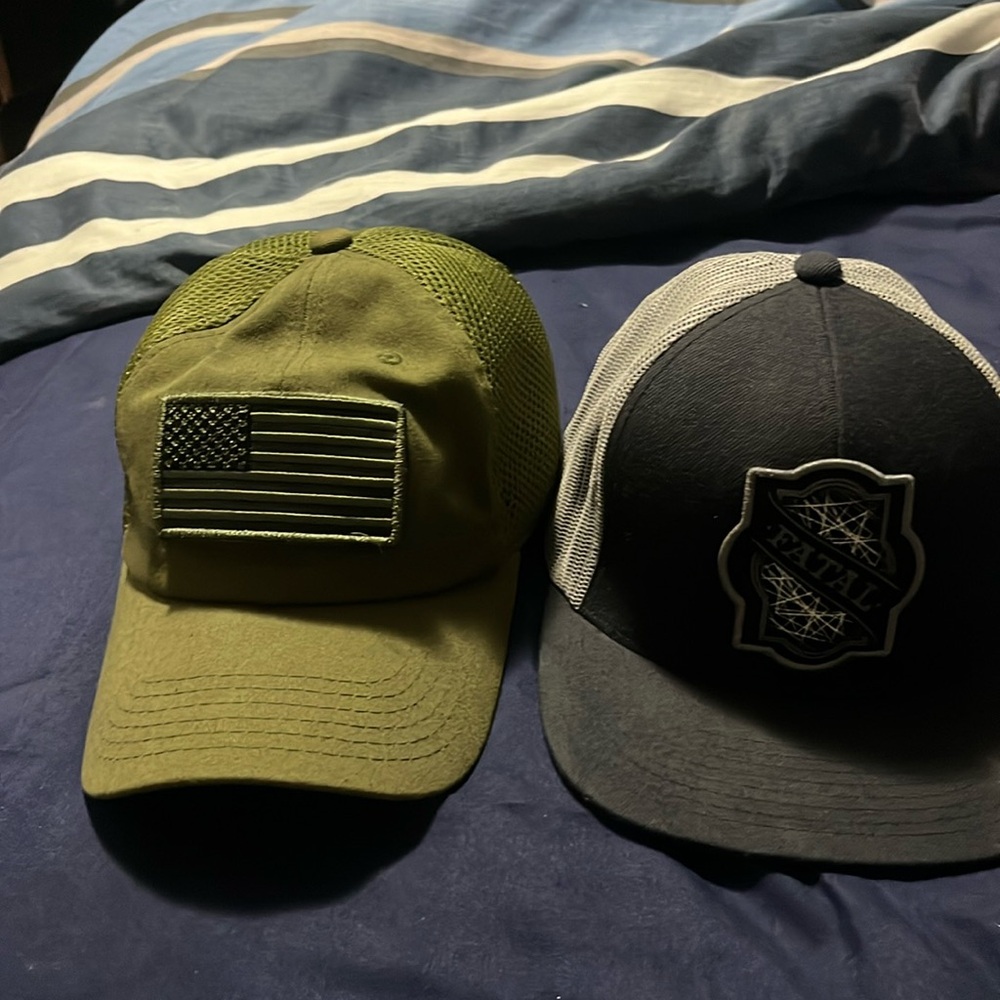 Two men regularly face cap. One is US Military like and the blue a Fatal
